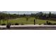 Community park with grassy area and walking paths at 5420 S 253Rd Ln, Buckeye, AZ 85326