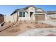 Single story home with two car garage and desert landscaping at 5420 S 253Rd Ln, Buckeye, AZ 85326