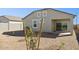 Desert landscaping with gravel and small trees at 5420 S 253Rd Ln, Buckeye, AZ 85326