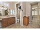 Primary bathroom with double vanity and separate toilet area at 13055 W Eagle Talon Trl, Peoria, AZ 85383