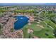 Aerial view of a pond and golf course at 13055 W Eagle Talon Trl, Peoria, AZ 85383