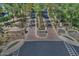 Community entrance with palm trees and stone accents at 13055 W Eagle Talon Trl, Peoria, AZ 85383