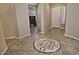 Spacious entryway with tile flooring and views to other rooms at 13055 W Eagle Talon Trl, Peoria, AZ 85383
