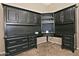 Corner office with built-in desk and cabinetry at 13055 W Eagle Talon Trl, Peoria, AZ 85383