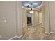 Elegant entryway with decorative tile and high ceilings at 13055 W Eagle Talon Trl, Peoria, AZ 85383