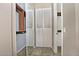 Walk-in closet with mirrored doors and built-in shelves at 13055 W Eagle Talon Trl, Peoria, AZ 85383