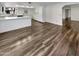 Open concept kitchen with island and white cabinets at 1509 N Iowa St, Chandler, AZ 85225