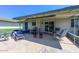 Relaxing patio with seating, a dining area, and a covered area at 13408 N Cedar Dr, Sun City, AZ 85351