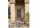Front entry with security door and tile flooring at 9510 W Menadota Dr, Peoria, AZ 85382