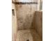 Tiled walk-in shower with neutral tones at 9510 W Menadota Dr, Peoria, AZ 85382