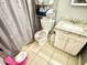 Clean bathroom with granite vanity, shower, and toilet at 5418 W Belleview St, Phoenix, AZ 85043