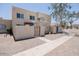 Front view of a light beige stucco townhome at 5418 W Belleview St, Phoenix, AZ 85043