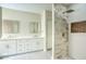 Spa-like bathroom with double vanity, large shower, and modern fixtures at 3981 N 155Th Ave, Goodyear, AZ 85395