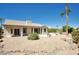 Relaxing backyard oasis with a covered patio and gravel landscaping at 3981 N 155Th Ave, Goodyear, AZ 85395
