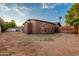 Backyard view of single-story home with large yard at 4301 E Bluefield Ave, Phoenix, AZ 85032