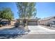 One-story house with a two-car garage and neat landscaping at 913 S 115Th Dr, Avondale, AZ 85323