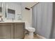 Bathroom with shower, toilet and double sink vanity at 913 S 115Th Dr, Avondale, AZ 85323