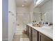 Bathroom with double vanity and a shower at 913 S 115Th Dr, Avondale, AZ 85323