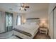 Main bedroom with king-size bed and nightstands at 913 S 115Th Dr, Avondale, AZ 85323