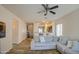 Spacious living room with sectional sofa and view of kitchen at 913 S 115Th Dr, Avondale, AZ 85323