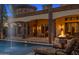 Luxury pool and spa with fire pit and lounge chairs at 9705 E Cholla St, Scottsdale, AZ 85260