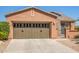 Lovely one-story home with a two-car garage and nicely landscaped yard at 26723 N 127Th Dr, Peoria, AZ 85383