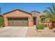 Charming one-story home with a two-car garage and well-maintained landscaping at 26723 N 127Th Dr, Peoria, AZ 85383