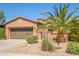 Beautiful one-story home, two-car garage, desert landscaping at 26723 N 127Th Dr, Peoria, AZ 85383