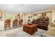 Spacious living area with comfortable seating and access to the kitchen at 26723 N 127Th Dr, Peoria, AZ 85383