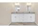 Bathroom with double vanity and granite countertops at 13036 N 20Th St, Phoenix, AZ 85022