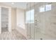 Elegant bathroom with soaking tub, walk-in shower, and modern finishes at 13036 N 20Th St, Phoenix, AZ 85022
