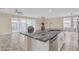 Spacious kitchen with large island, granite countertops, and stainless steel appliances at 13036 N 20Th St, Phoenix, AZ 85022