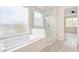 Bathroom boasts a large walk-in shower and a soaking tub at 13036 N 20Th St, Phoenix, AZ 85022