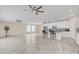 Open concept kitchen with island, stainless steel appliances, and white cabinets at 13036 N 20Th St, Phoenix, AZ 85022