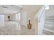 Bright entryway with stairs, wood-look flooring, and interior door at 13036 N 20Th St, Phoenix, AZ 85022