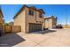 Two-story house with garage and a paved driveway at 824 E Agua Fria Ln, Avondale, AZ 85323