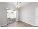 Dining area with sliding glass door leading to the backyard at 824 E Agua Fria Ln, Avondale, AZ 85323