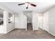 Open living area with a staircase and access to the kitchen at 824 E Agua Fria Ln, Avondale, AZ 85323