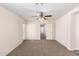 Bedroom with door to hallway and window at 847 E Agua Fria Ln, Avondale, AZ 85323