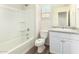Bathroom with tub, toilet and vanity at 847 E Agua Fria Ln, Avondale, AZ 85323
