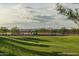Community basketball court with seating and shade at 2428 W Rowel Rd, Phoenix, AZ 85085