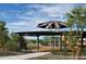 Covered playground with climbing wall and slide at 2428 W Rowel Rd, Phoenix, AZ 85085