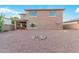 Large backyard with gravel and fire pit area at 17797 W Carmen Dr, Surprise, AZ 85388