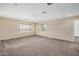 Bright bedroom with carpeted floors and window blinds at 17797 W Carmen Dr, Surprise, AZ 85388