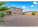 Spacious backyard with gravel and desert landscaping at 17797 W Carmen Dr, Surprise, AZ 85388