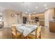 Kitchen dining area with seating for four and views to kitchen at 17797 W Carmen Dr, Surprise, AZ 85388