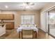 Bright dining area with sliding door access to backyard at 17797 W Carmen Dr, Surprise, AZ 85388