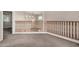 Spacious upstairs hallway with a view to the lower floor at 17797 W Carmen Dr, Surprise, AZ 85388