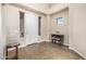 Entryway with tile floor, wooden console table, and side table at 17797 W Carmen Dr, Surprise, AZ 85388