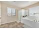 Bathroom features a soaking tub, shower, and tile flooring at 17797 W Carmen Dr, Surprise, AZ 85388